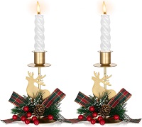 Reindeer candlestick holders with Christmas bow decor