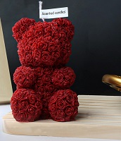 Rose decorated teddy bear candle